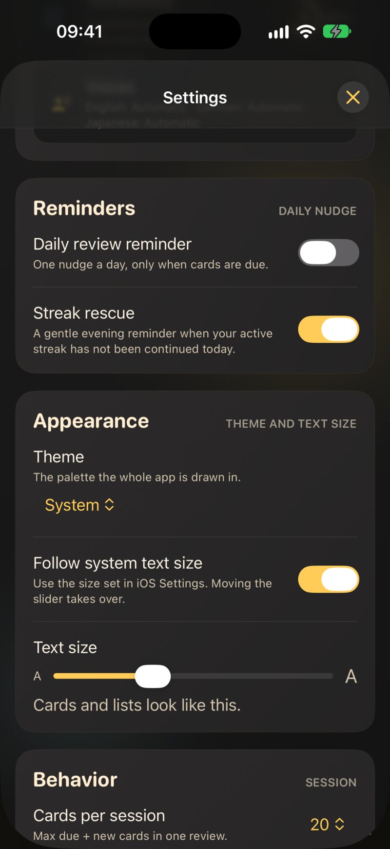 The Appearance section in Settings: the theme menu, the Follow system text size switch and the Text size slider with its preview.